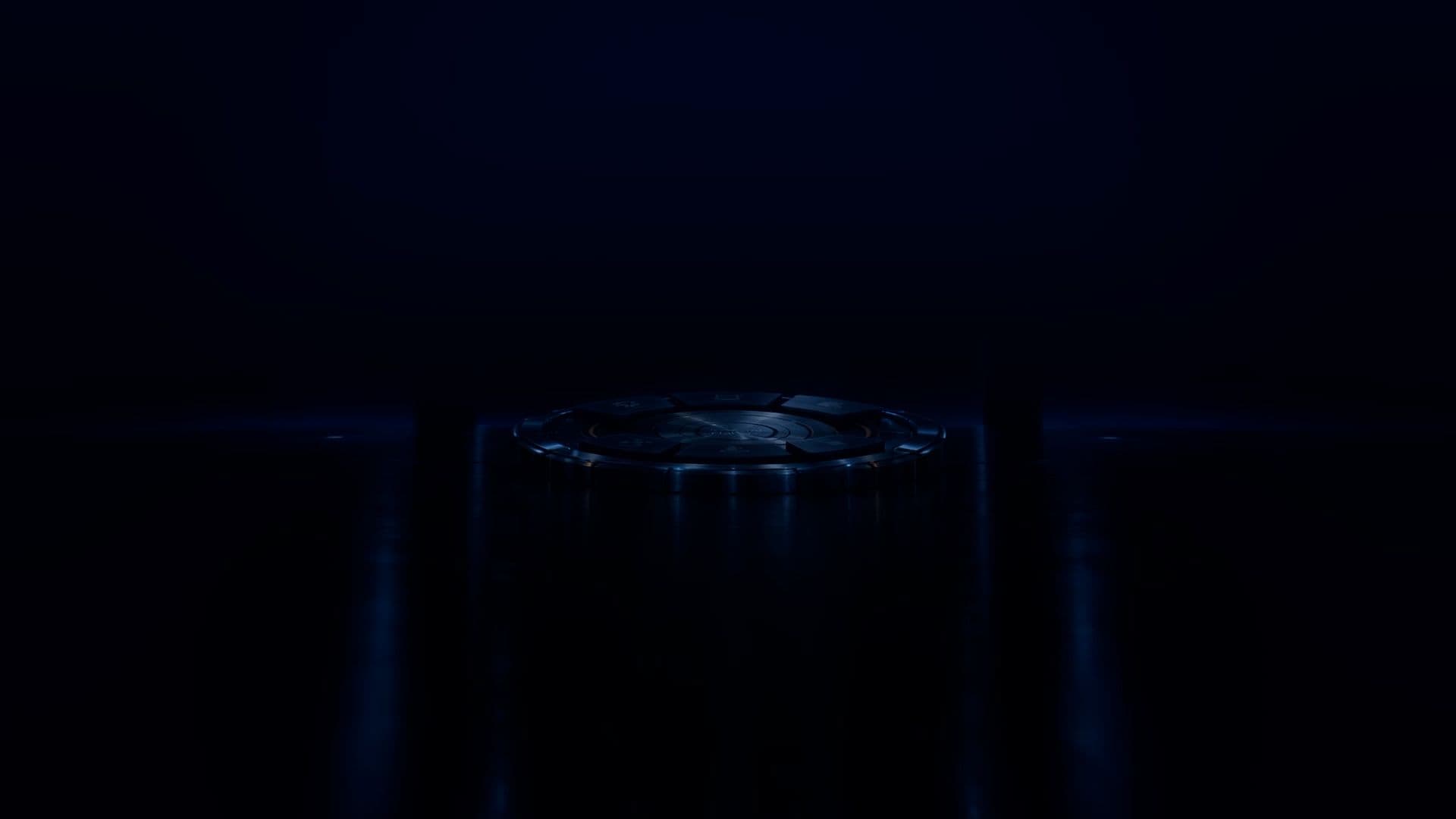 A glowing blue circular platform with intricate patterns in a dark, futuristic void.
